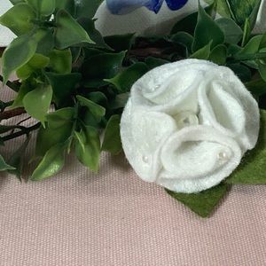 White flower to decorate babies head made with felt